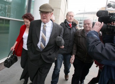 Kevin Crilly (centre) leaving Belfast Crown Court earlier today after his acquittal.