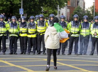 A protesters confronts gardaí at Christchurch in Dublin yesterday.