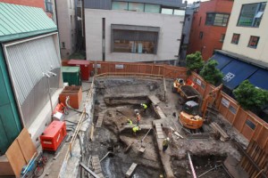 Archaeologists digging at the site in Meeting House Square