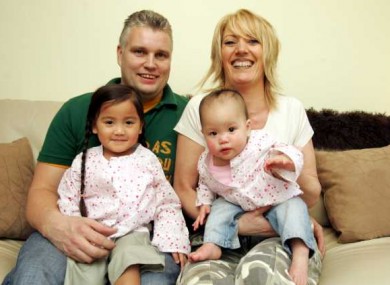 Derek and Ursula Hickey who adopted Mia (left) and Abi from Vietnam (File photo, 2005)
