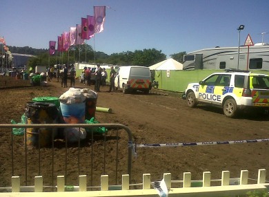 Police on the scene backstage at Glastonbury this afternoon.