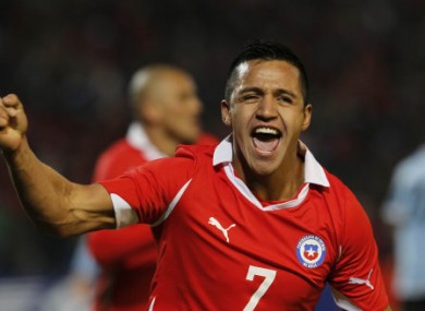 Sanchez celebrates his equaliser against Uruguay.