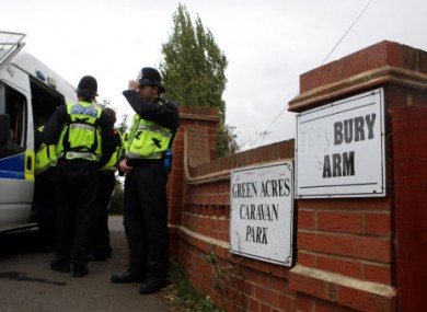 Police at the Leighton Buzzard caravan site yesterday.