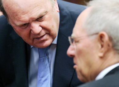 Michael Noonan and his German counterpart Wolfgang Schauble: a briefing document prepared by Schauble's ministry says Ireland will miss its 2013 targets for cutting the deficit.