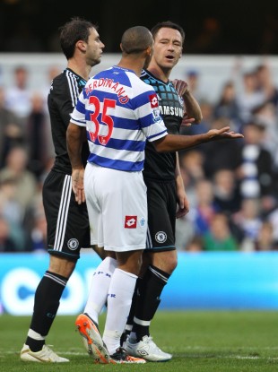 Anton Ferdinand argues with John Terry at Loftus Road.