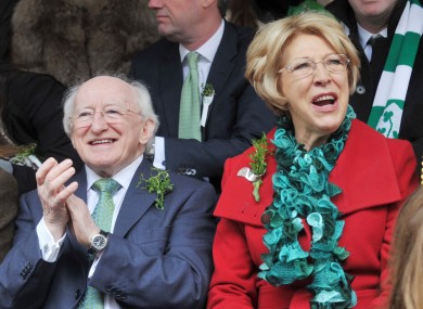 President Michael D Higgins and his wife Sabina at the St Patrick's Day parades: Irish people rank 10th in the world for happiness, according to a new UN report.
