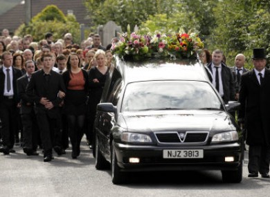 Mourners gathered for the funeral of Marion Graham in August 2011.