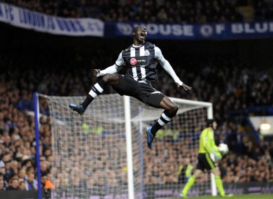 Cisse celebrates one of his two stunning goals.