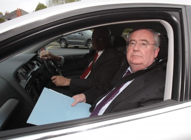 Communications Minister Pat Rabbitte arrives at RTE studios yesterday following the publication of the report