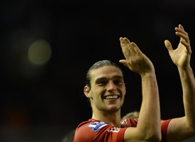 Liverpool's Andy Carroll applauds supporters after his team's 4-1 wi over Chelsea