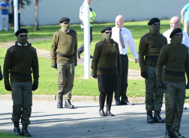 Real IRA members stand to attention at the funeral of Alan Ryan.