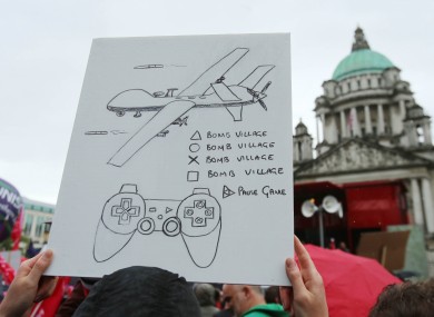 An anti-drone placard held aloft at the G8 protests in Belfast yesterday.
