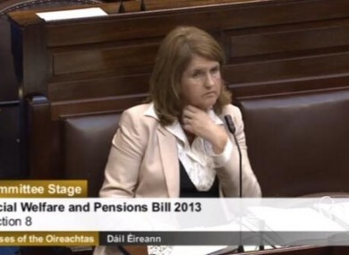 Joan Burton listens to arguments against cutting the bereavement grant