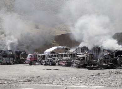 NATO supply trucks burn following an attack by Taliban militants on a US base in the Torkham area near the Pakistan-Afghanistan border in Jalalabad in September.
