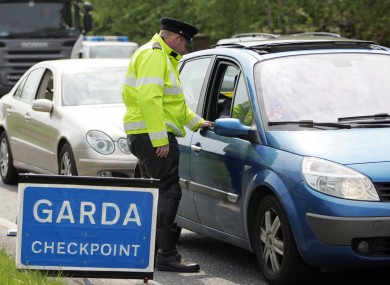 File photo of a car stopped at a Garda Checkpoint.
