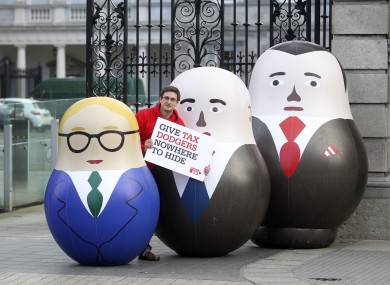 Pictured Christian Aid Campaign Officer David Thomas is pictured outside Leinster House yesterday with three blow up Russian style dolls that represent owners of Phantom companies, which Christian Aid say companies use to avoid paying tax and to launder money.