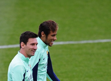 Messi and teammate Neymar during training yesterday.