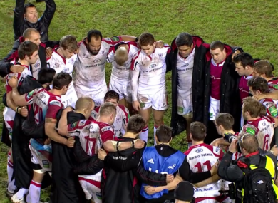 The Ulster players huddle around captain Johann Muller.