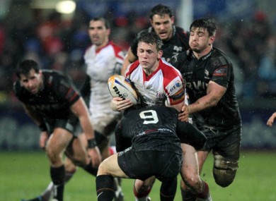 Craig Gilroy runs into an Ospreys road-block.