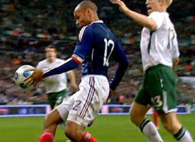 Thierry Henry keeps the ball in play against Ireland in 2009.