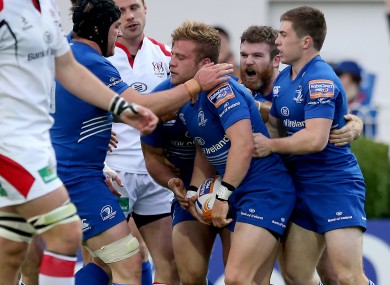 Leinster players swarm to Madigan after his semi final try against Ulster.