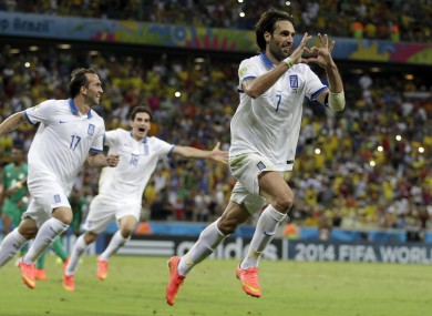 Greece's Giorgos Samaras celebrates scoring his side's second goal from the penalty spot.