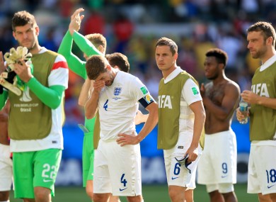England captain Steven Gerrard and the England players at the final whistle.